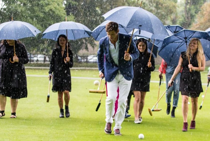Sheltering from the downpour L to R Monicha Tully Stephanie Pak Malcom Borwick Flo Wales Bonner Sarah Finley